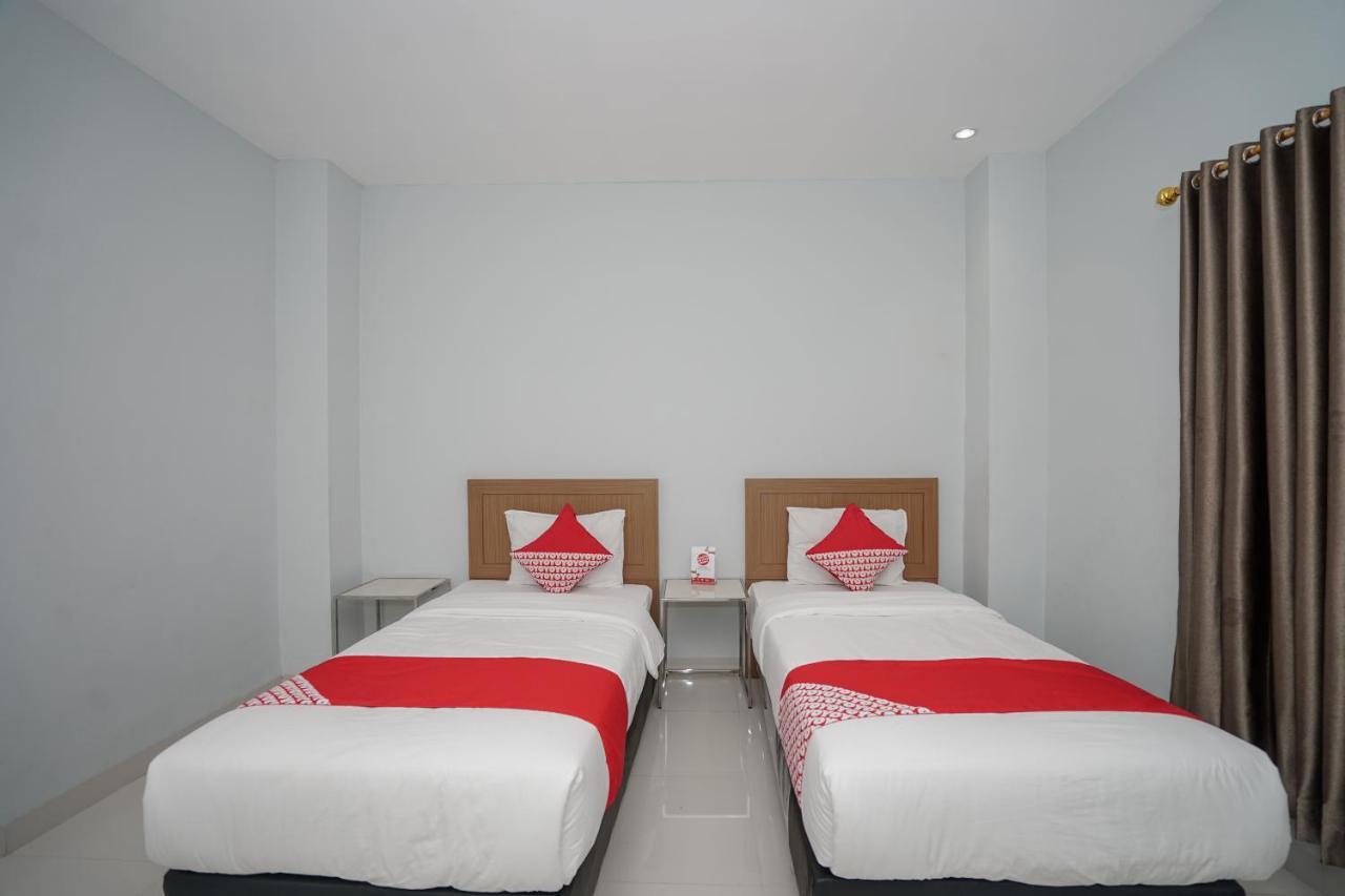 Oyo 616 Express Inn Palembang Exterior photo